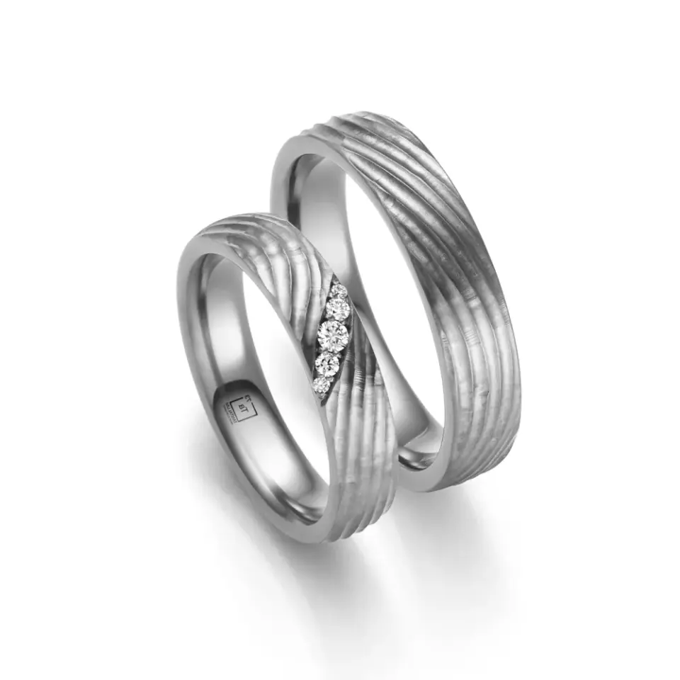 Alianzas de boda de tántalo con diamantes