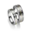 Alianzas de boda de tántalo y oro amarillo con diamante