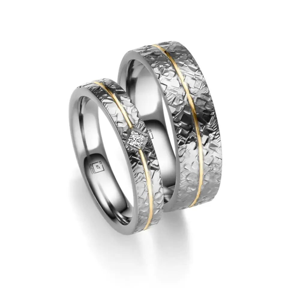 Alianzas de boda de tántalo y oro amarillo con diamante