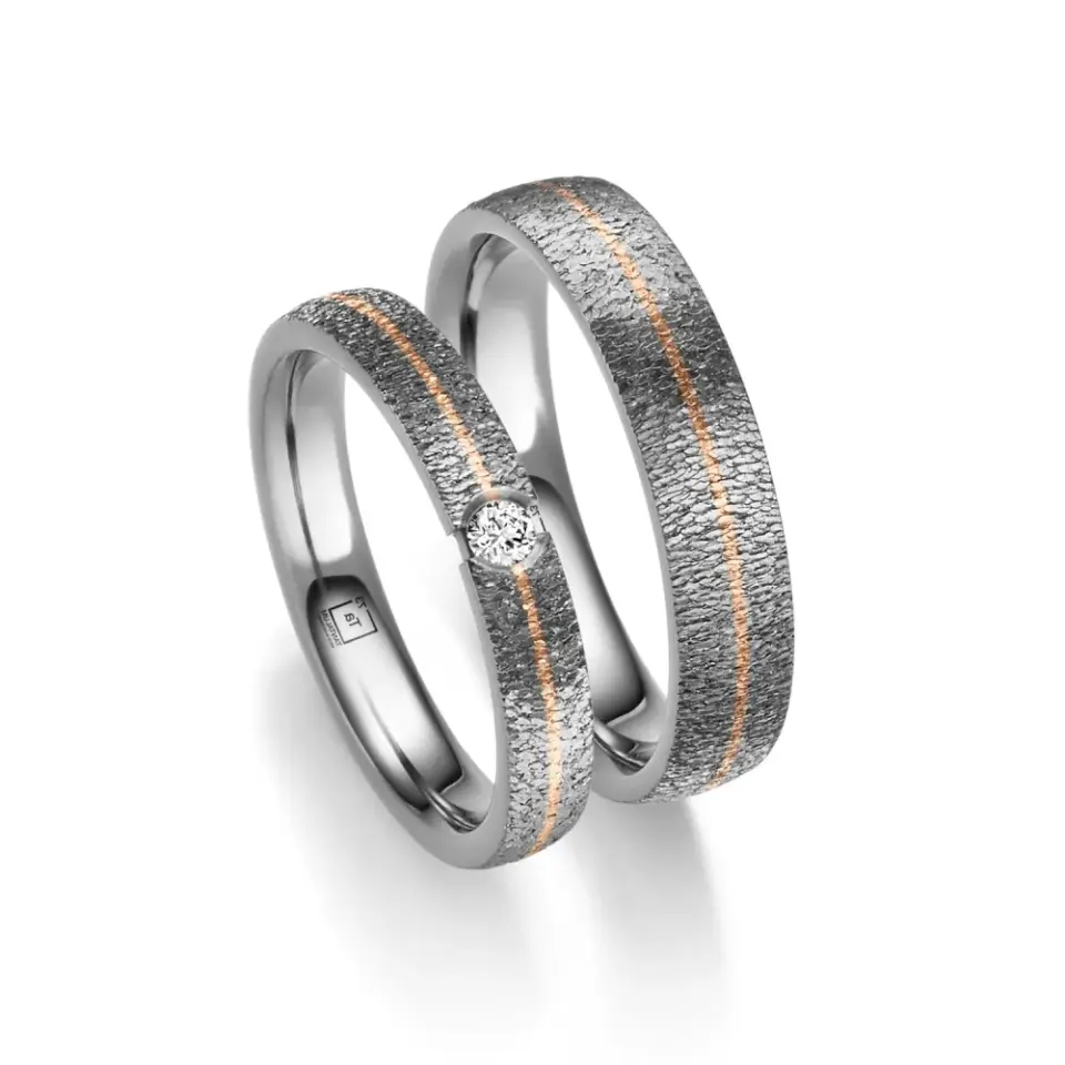 Alianzas de boda de tántalo y oro rosado con diamante