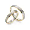 Alianzas de boda de oro amarillo y oro blanco con diamante