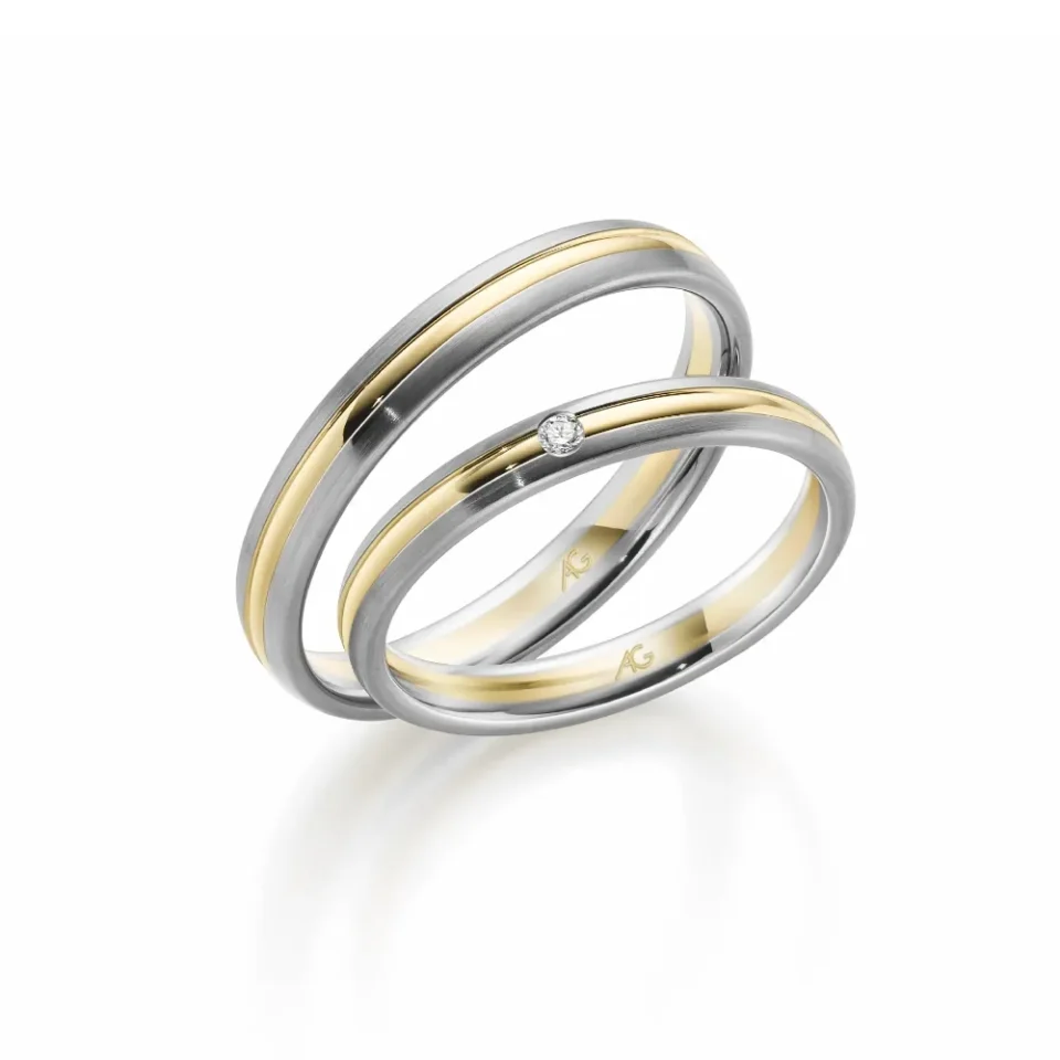 Alianzas de boda de paladio y oro amarillo con diamante