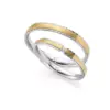 Alianzas de boda de oro amarillo y oro blanco con diamante