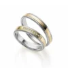 Alianzas de boda de oro amarillo y oro blanco con diamantes
