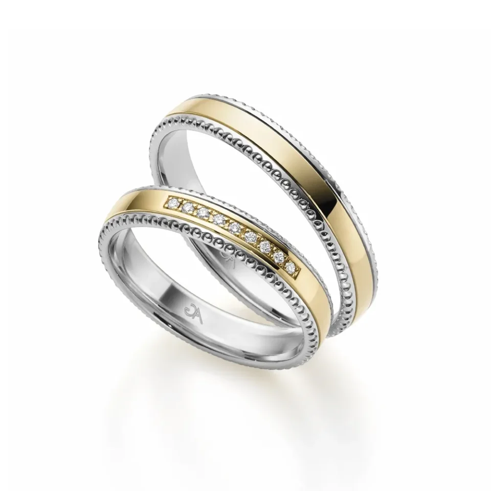 Alianzas de boda de oro amarillo y oro blanco con diamantes