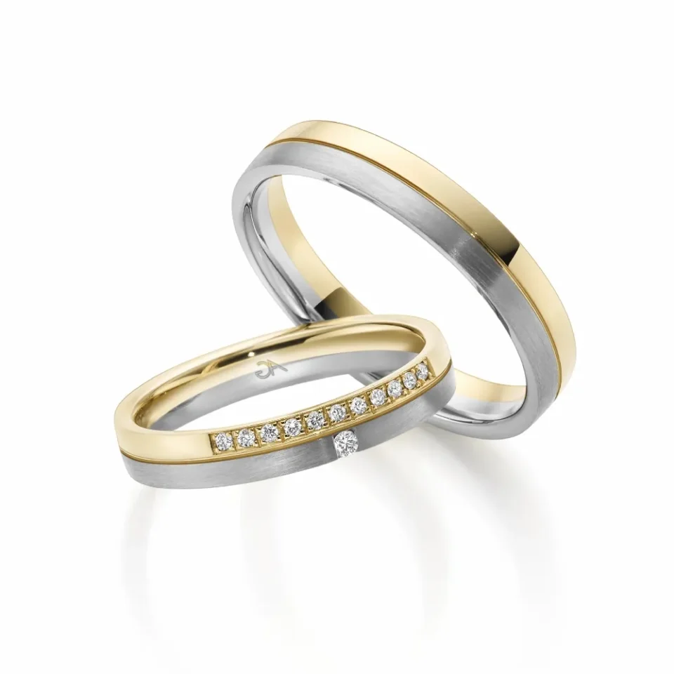 Alianzas de boda de platino y oro amarillo con diamantes