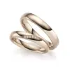 Alianzas de boda de oro champagne con diamantes