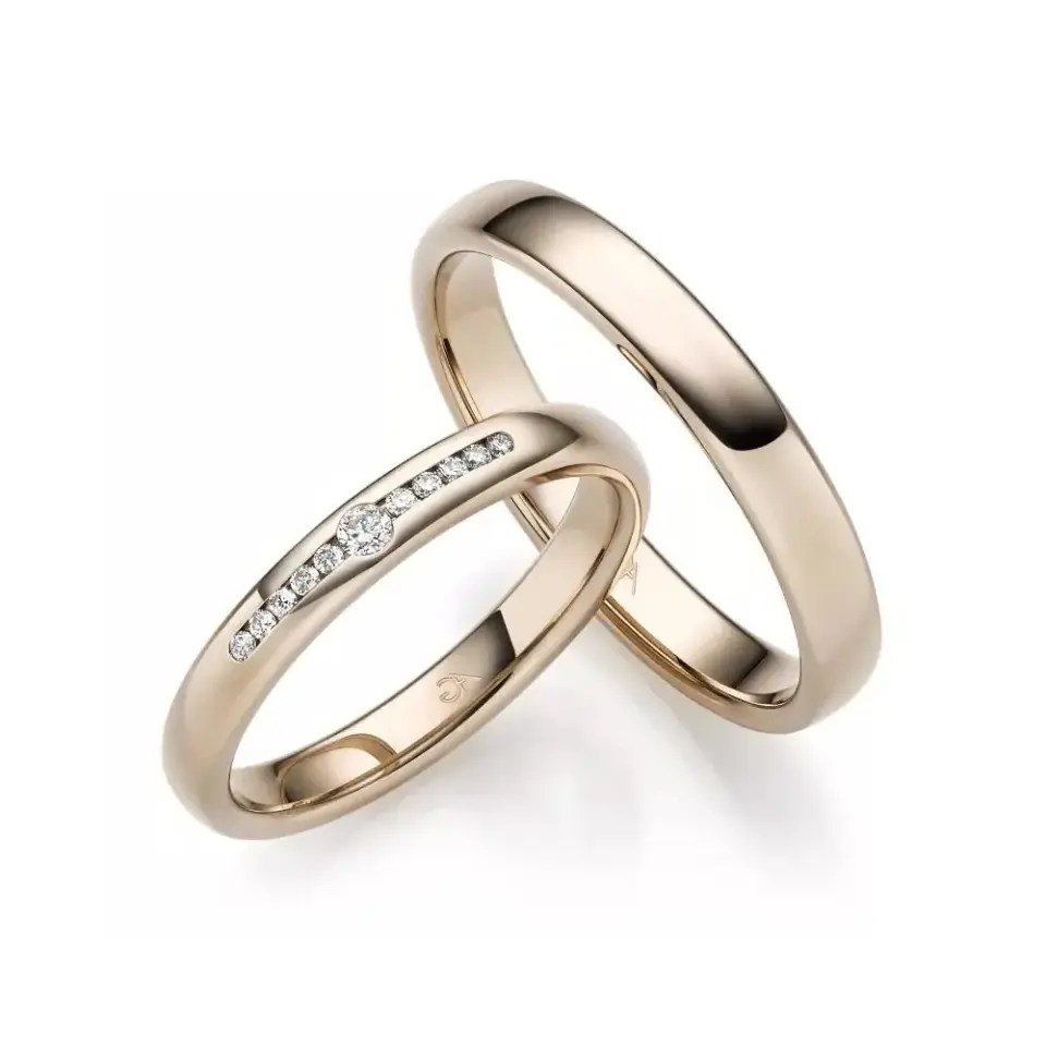 Alianzas de boda de oro champagne con diamantes