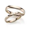 Alianzas de boda de oro champagne con diamantes