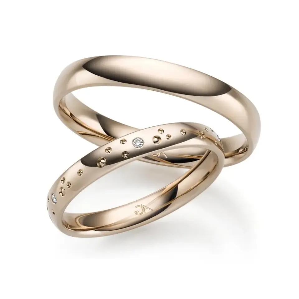 Alianzas de boda de oro champagne con diamantes