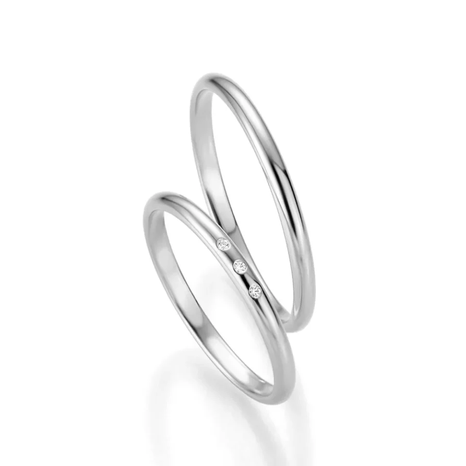 Alianzas de boda de paladio con diamantes