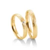 Alianzas de boda de oro amarillo con diamante
