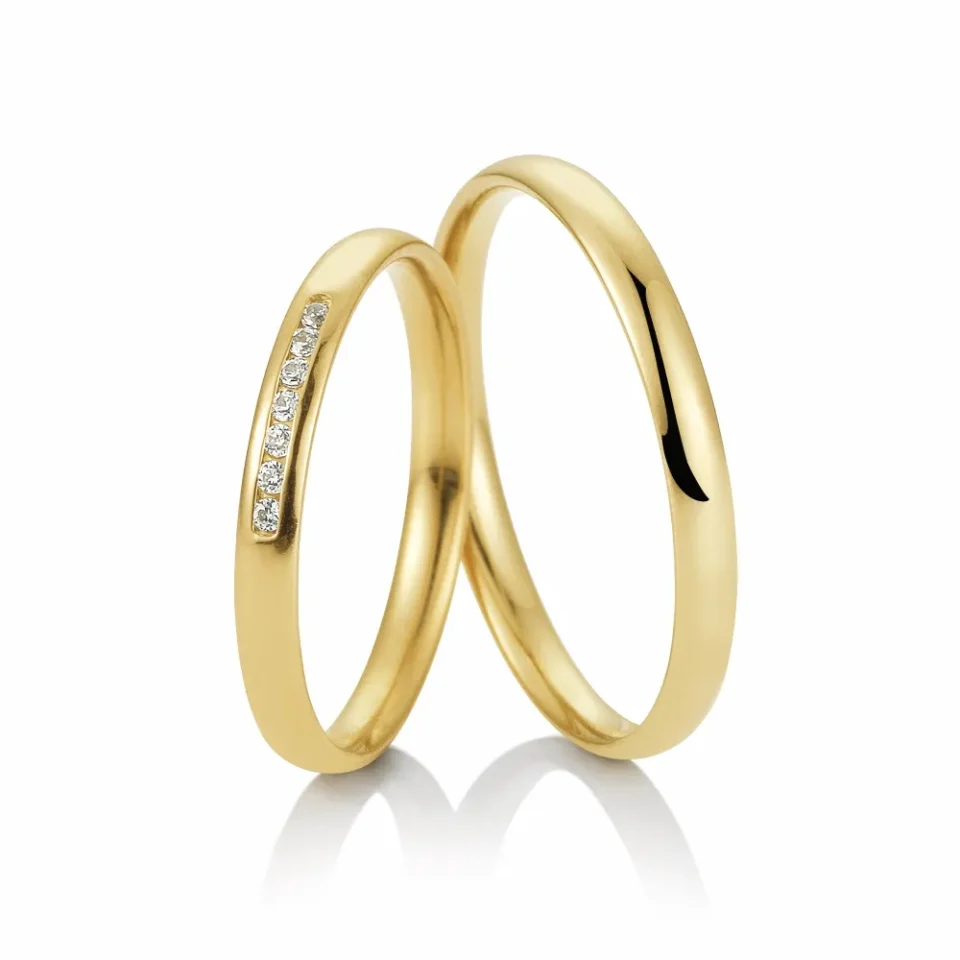 Alianzas de boda de oro amarillo con diamantes