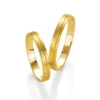 Alianzas de boda de oro amarillo con diamante