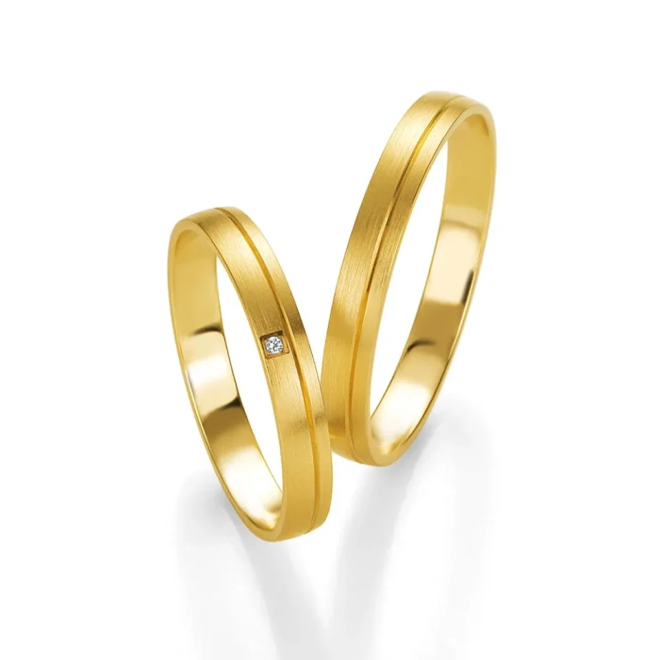 Alianzas de boda de oro amarillo con diamante
