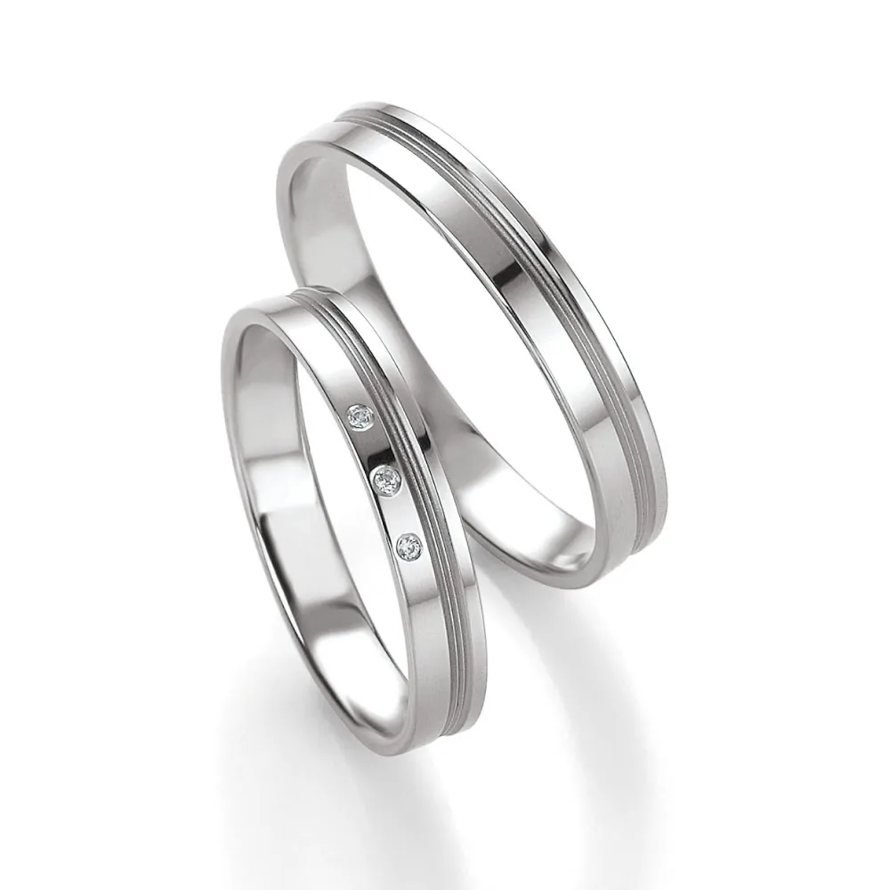 Alianzas de boda de paladio con diamantes