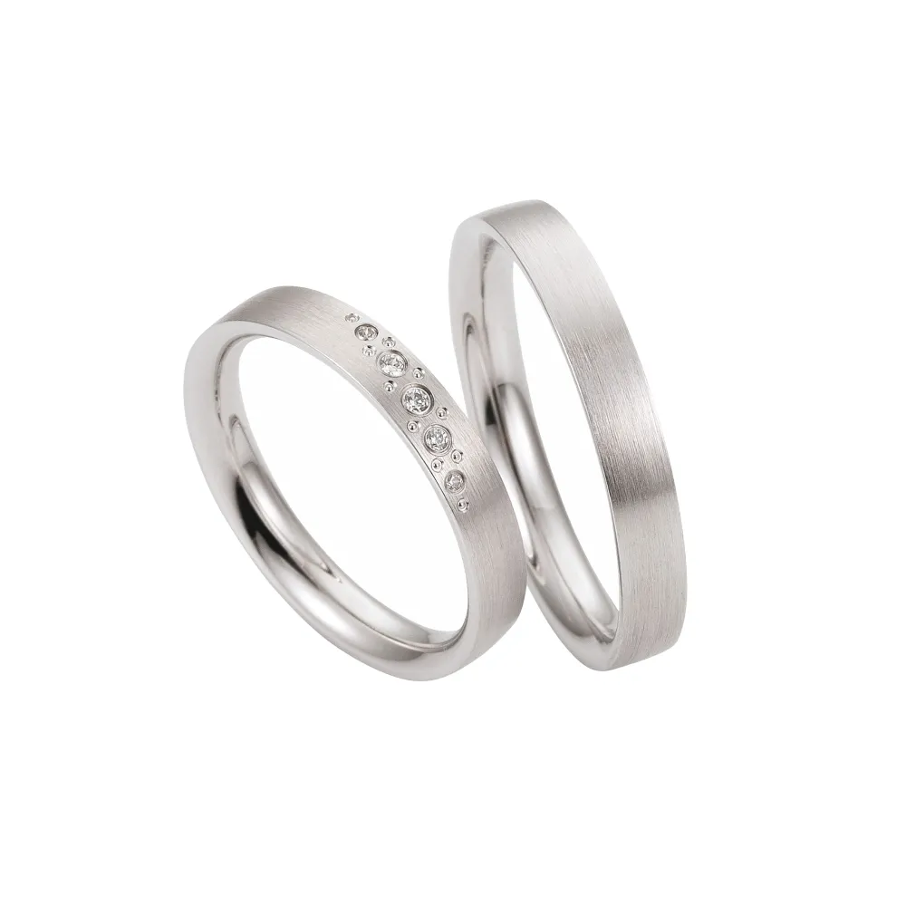 Alianzas de boda de paladio con diamantes
