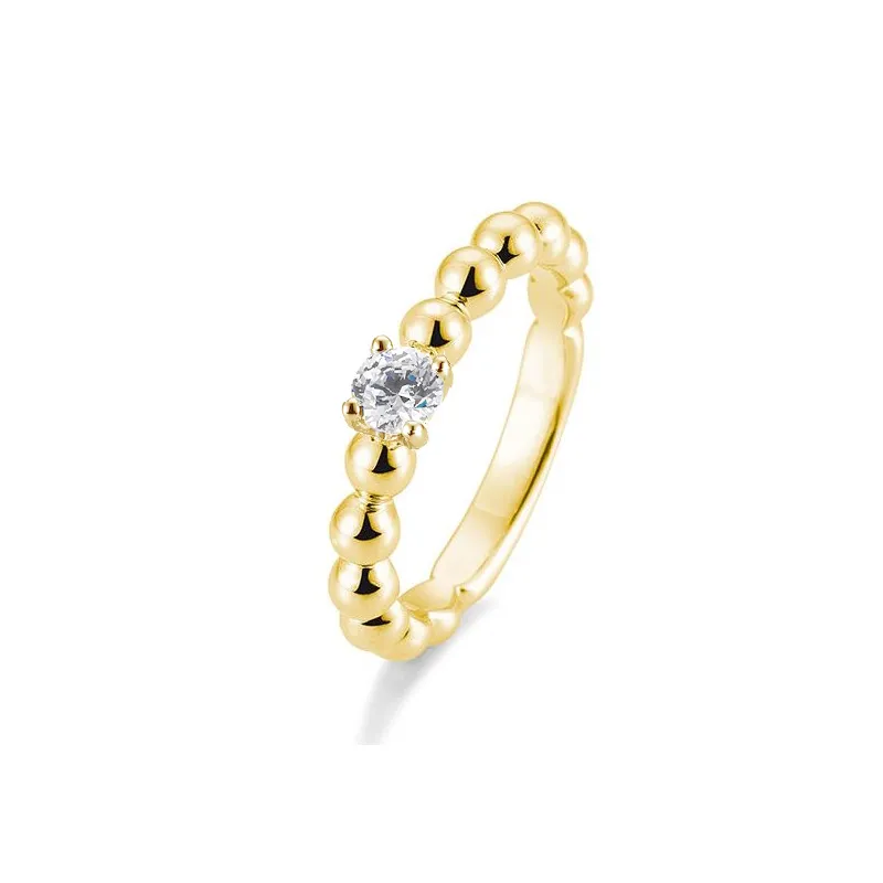 Anillo de compromiso de oro amarillo con diamante