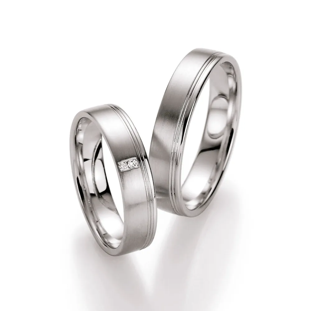 Alianzas de boda de platino con diamantes