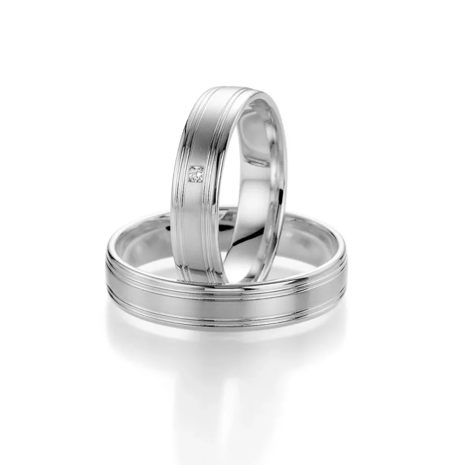 Alianzas de boda de oro blanco con diamante