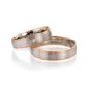 Alianzas de boda de oro rosado y paladio con diamante