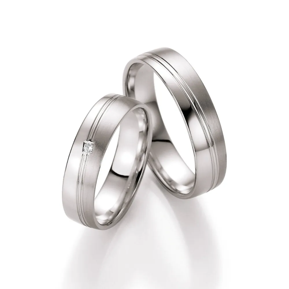 Alianzas de boda de platino con diamante