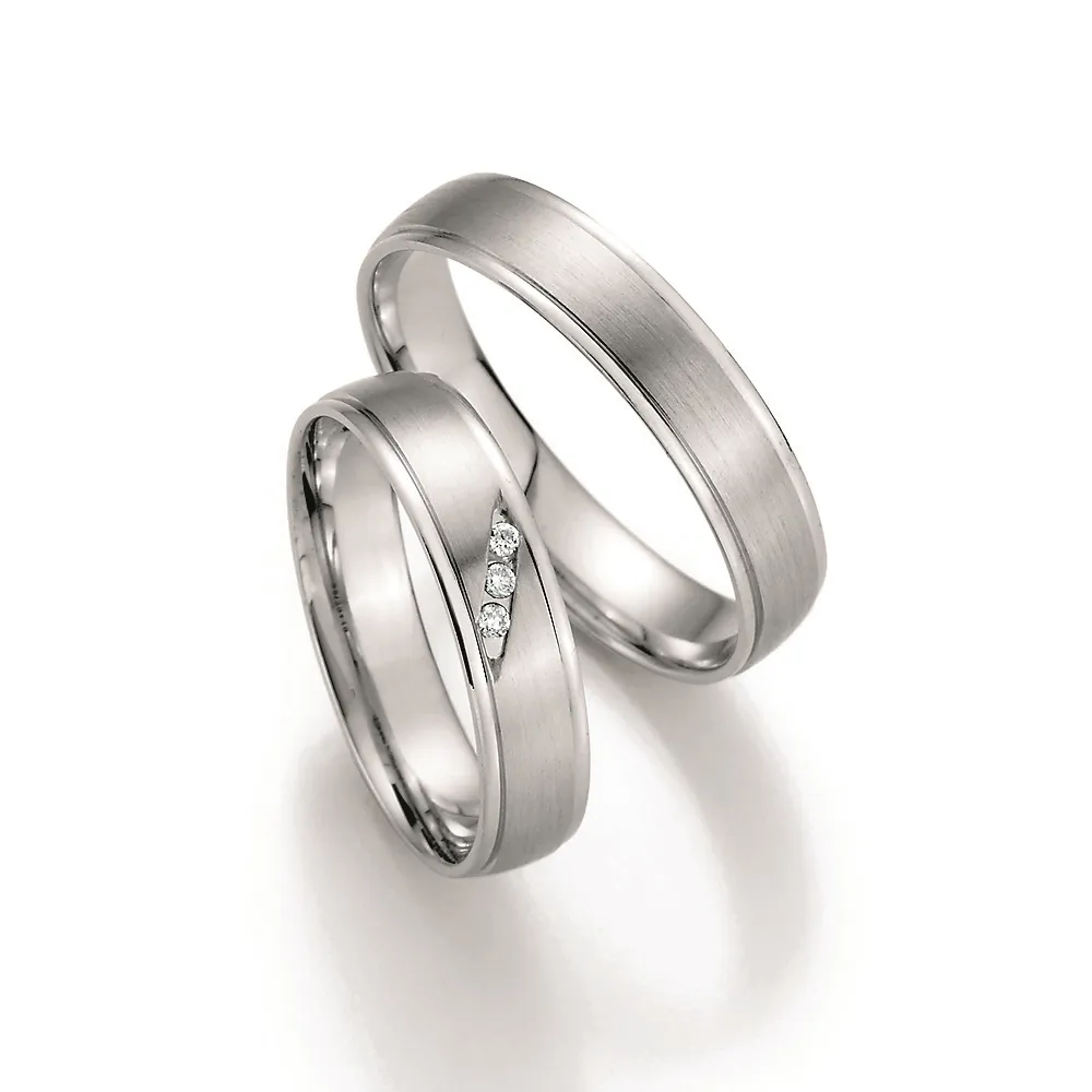 Alianzas de boda de paladio con diamantes