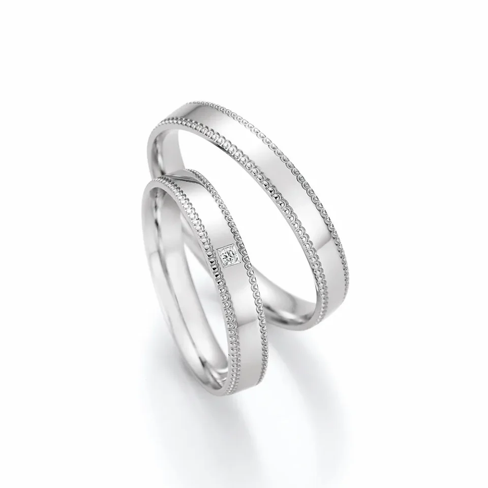 Alianzas de boda de oro blanco con diamante