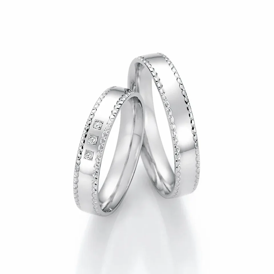 Alianzas de boda de paladio con diamantes