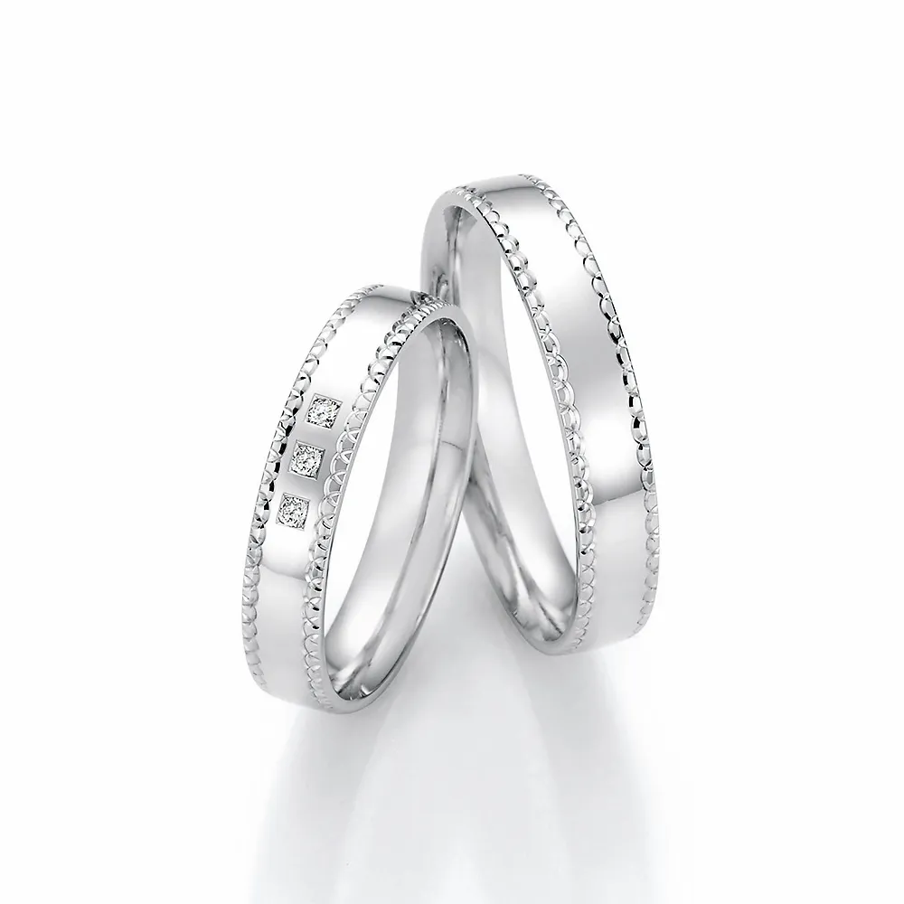 Alianzas de boda de paladio con diamantes