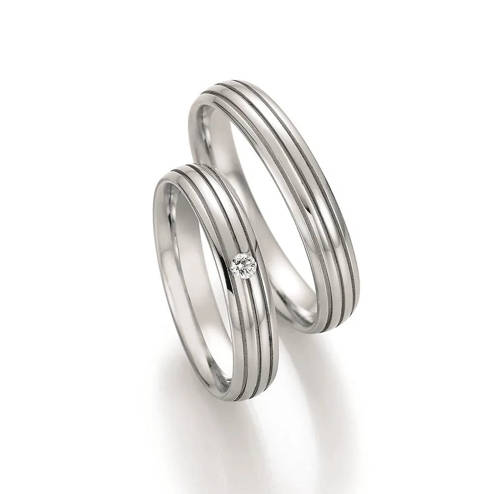Alianzas de boda de paladio con diamante