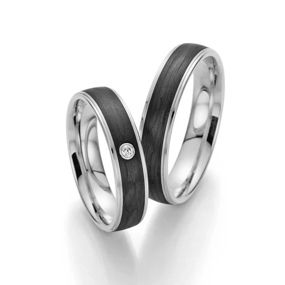Alianzas de boda de platino y carbono con diamante