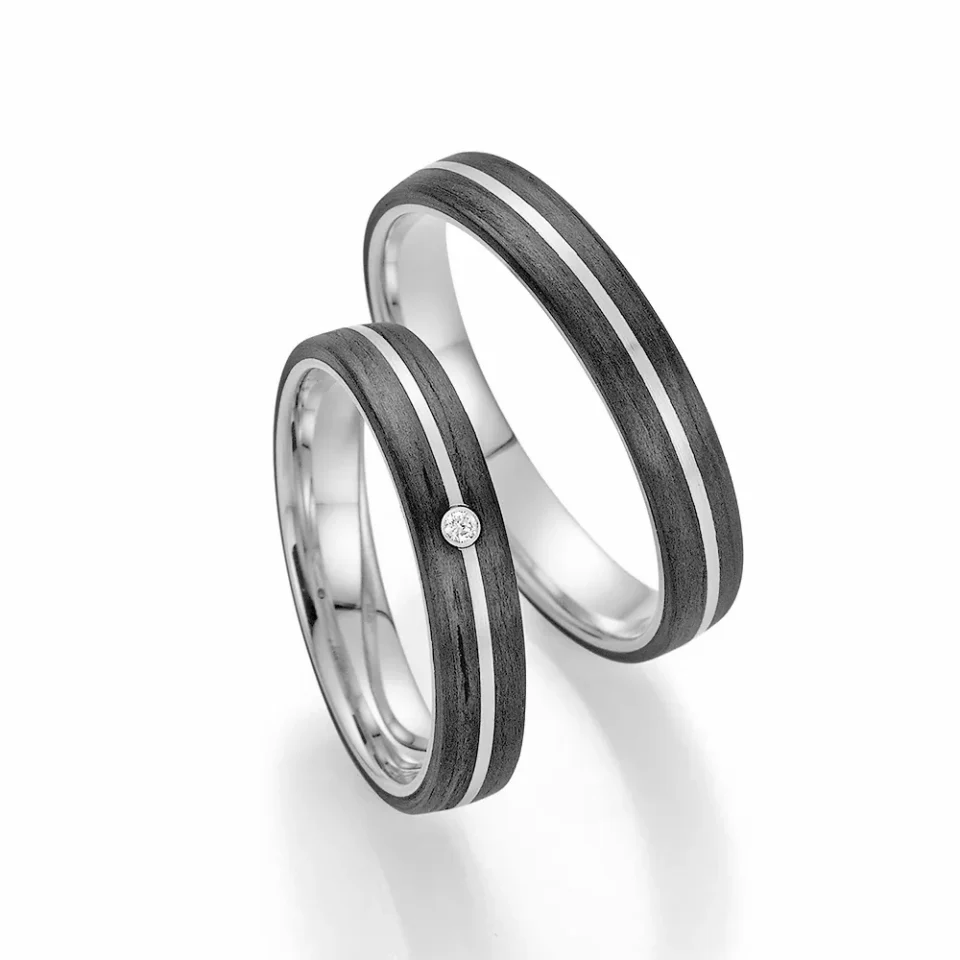Alianzas de boda de platino y carbono con diamante