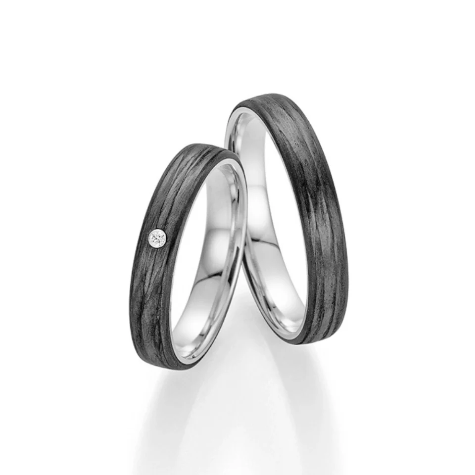 Alianzas de boda de platino y carbono con diamante