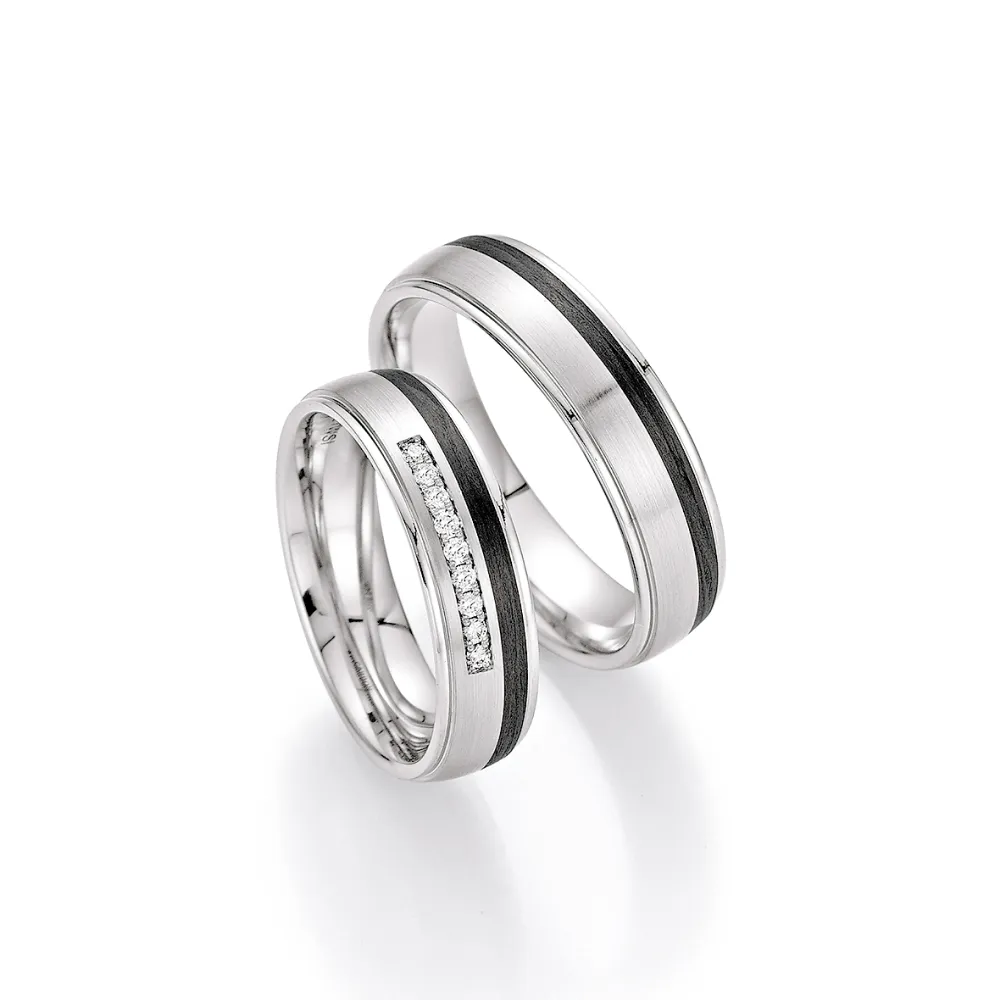 Alianzas de boda de platino y carbono con diamantes