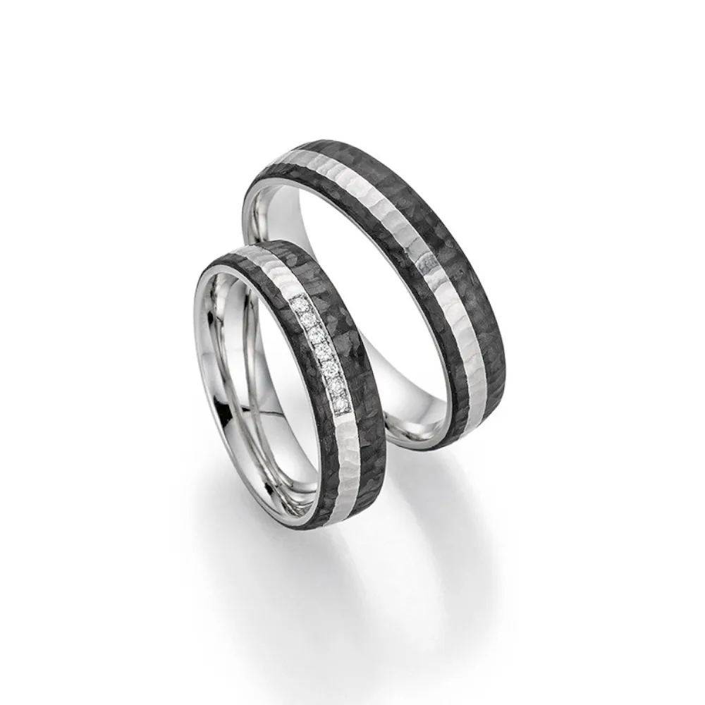 Alianzas de boda de platino y carbono con diamantes