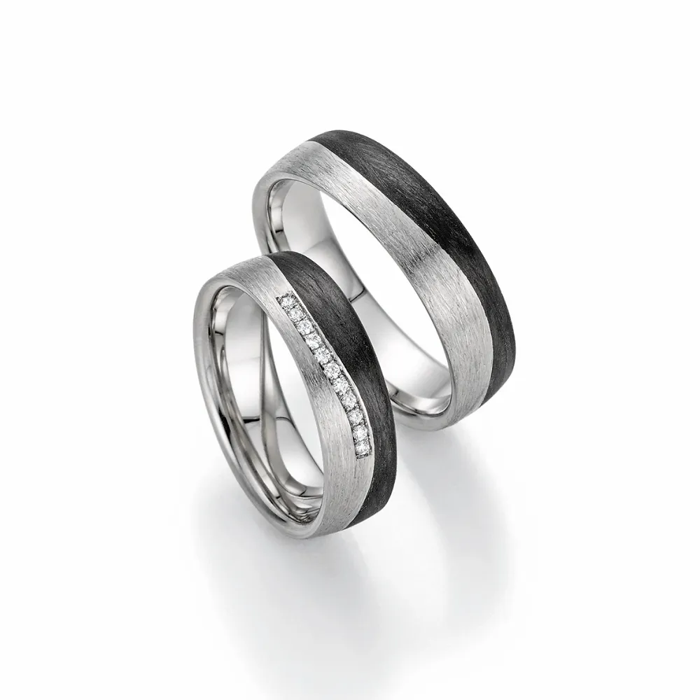 Alianzas de boda de platino y carbono con diamantes