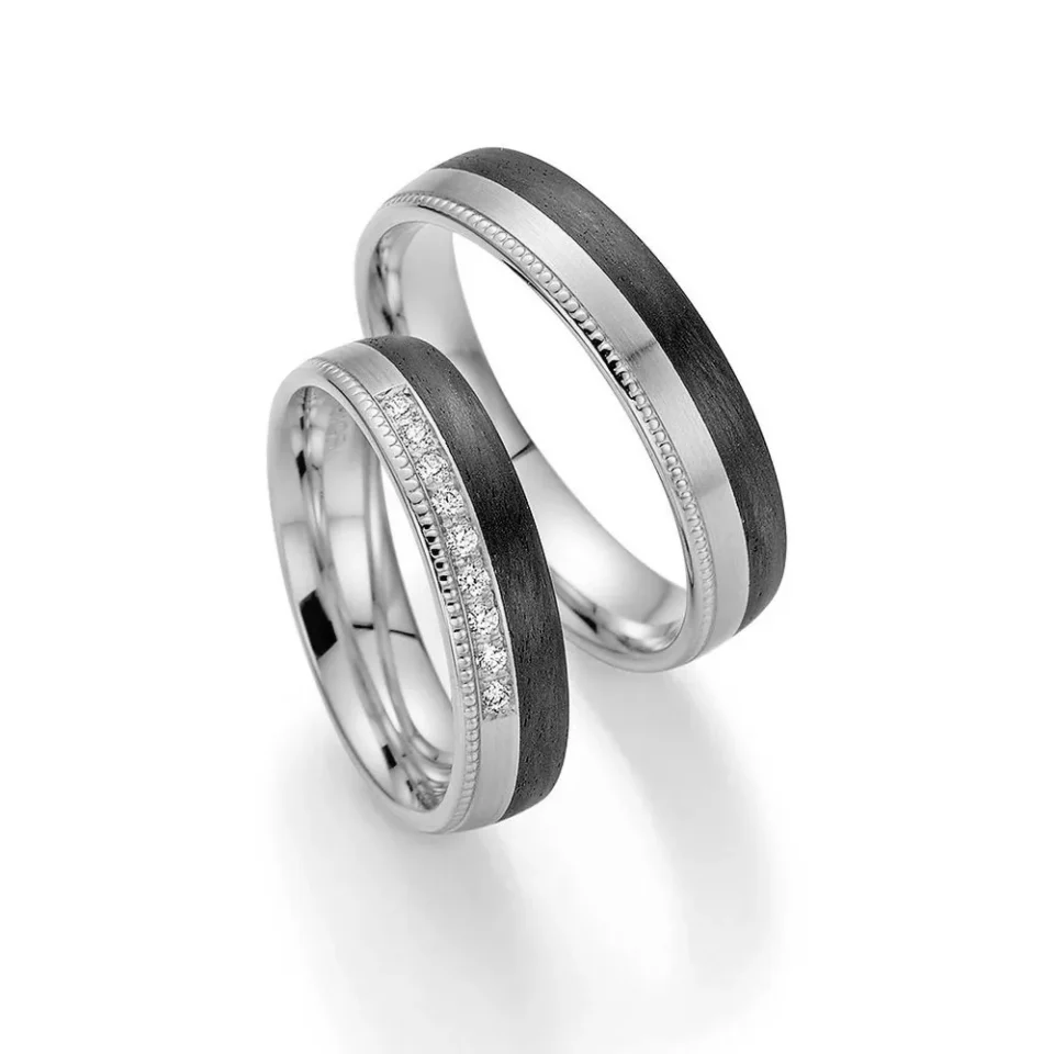 Alianzas de boda de platino y carbono con diamante