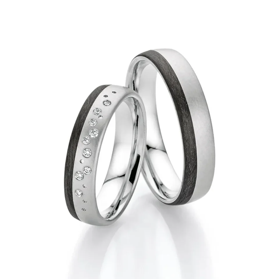 Alianzas de boda de platino y carbono con diamantes
