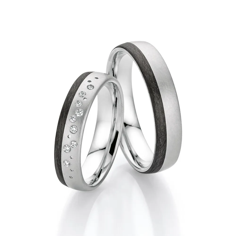 Alianzas de boda de platino y carbono con diamantes