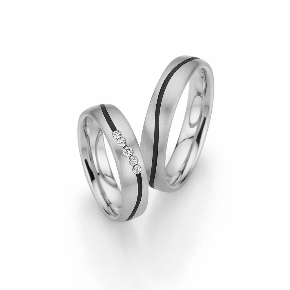 Alianzas de boda de platino y carbono con diamantes