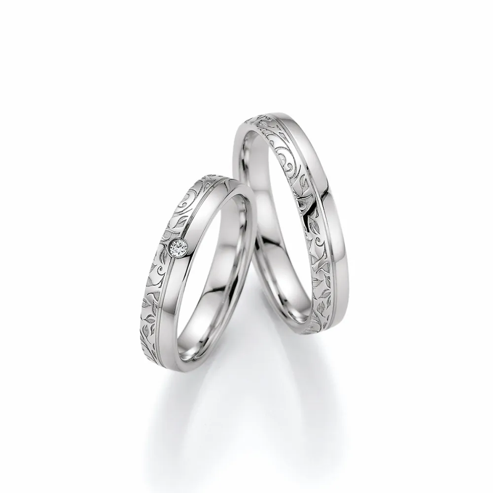 Alianzas de boda de platino con diamante