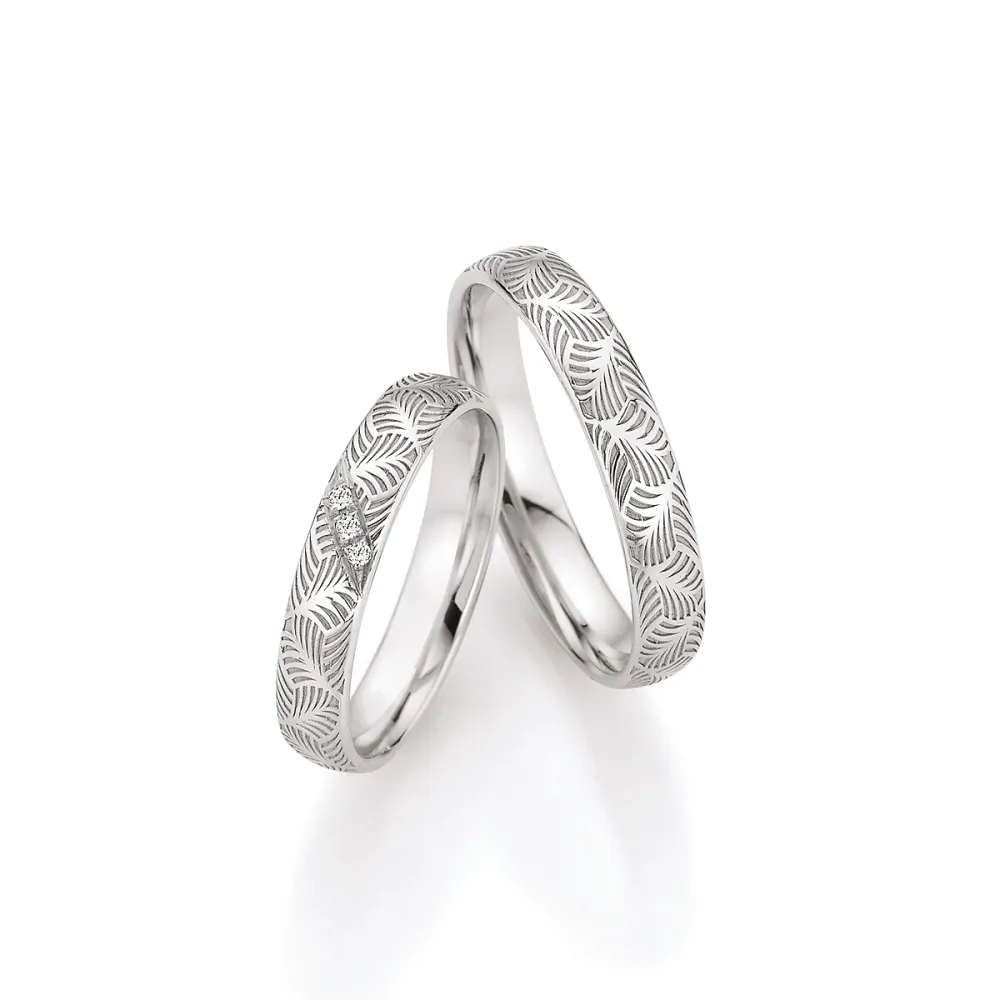 Alianzas de boda de oro blanco con diamantes
