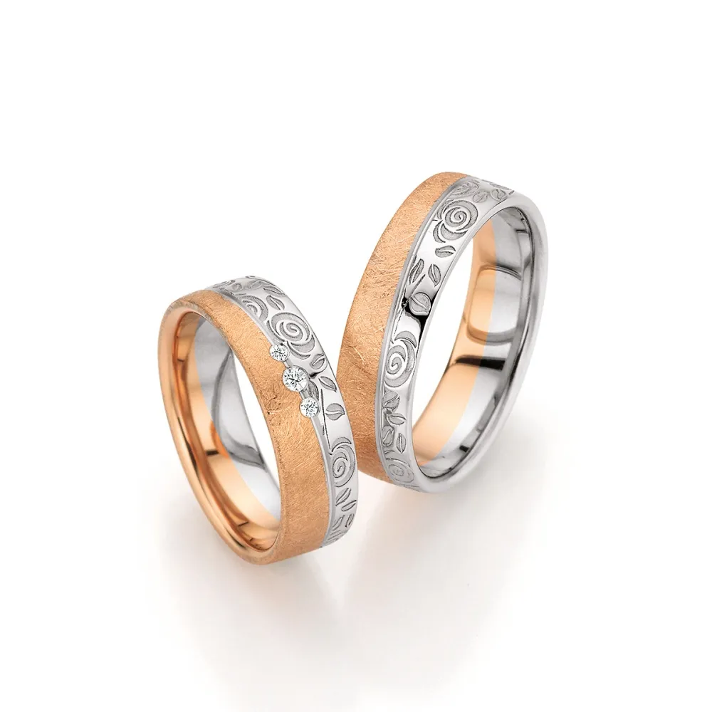 Alianzas de boda de platino y oro rosado con diamantes