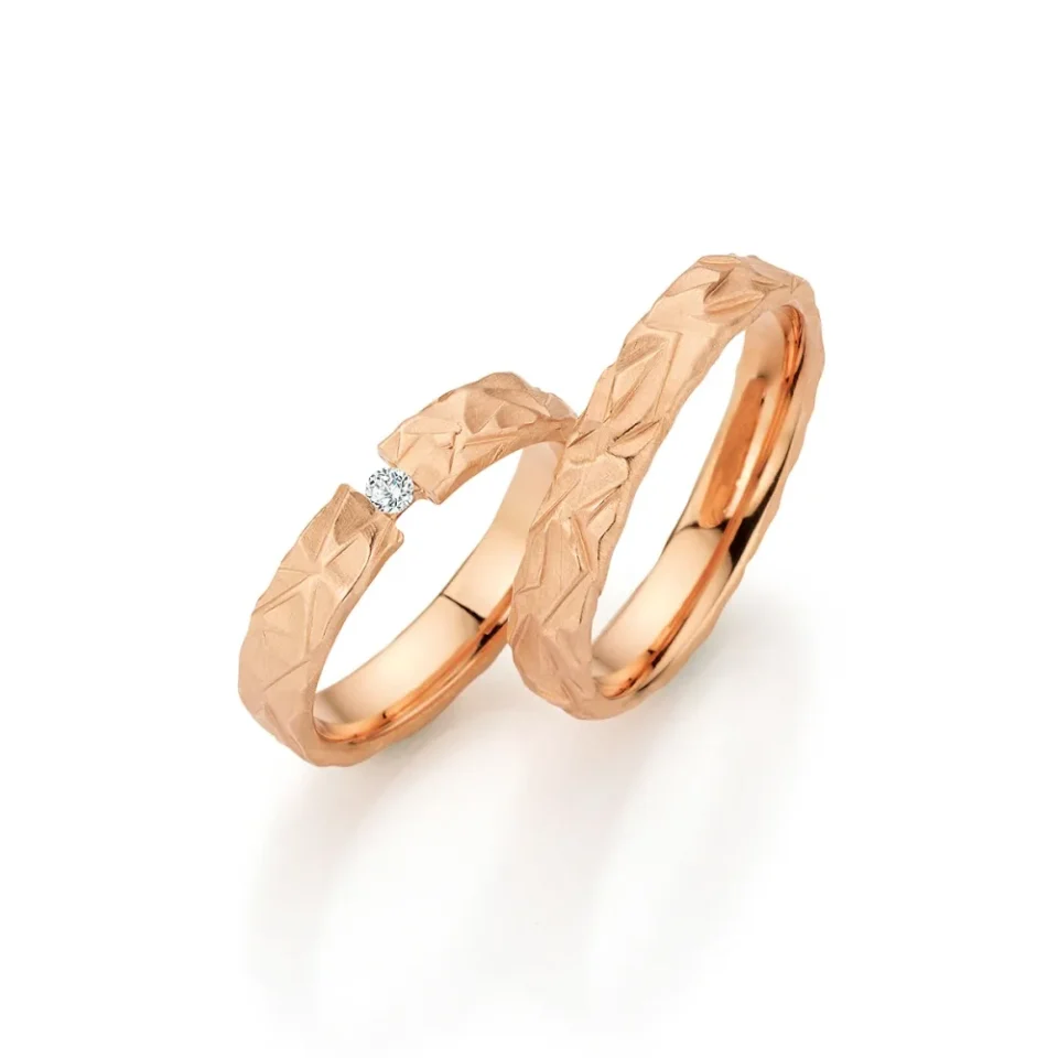 Alianzas de boda de oro rosado con diamante