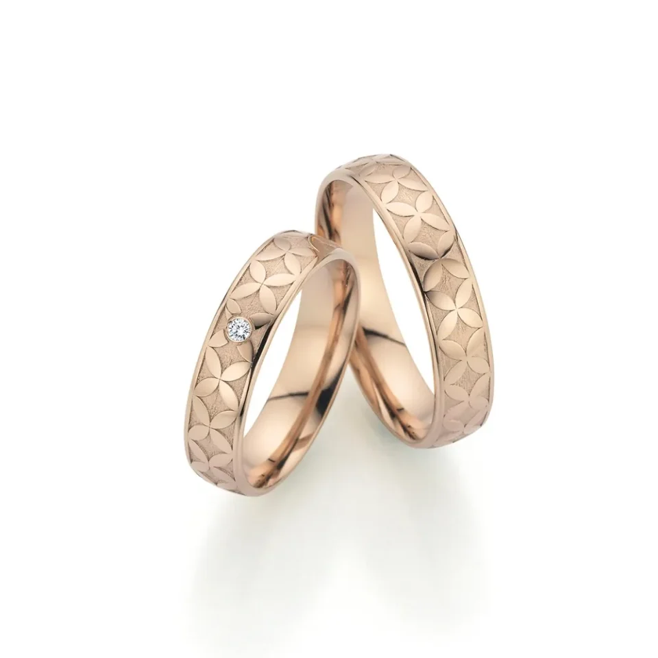 Alianzas de boda de oro champagne con diamante