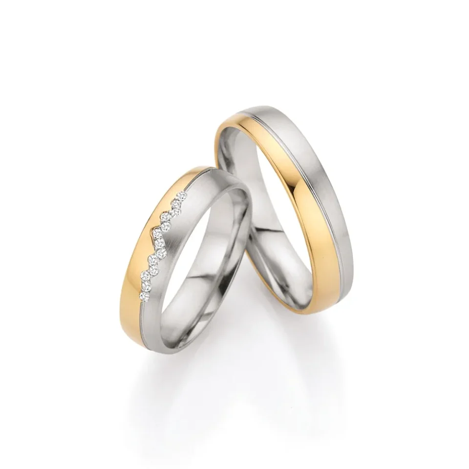 Alianzas de boda de oro blanco y oro albaricoque con diamantes