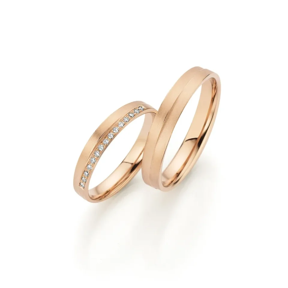 Alianzas de boda de oro champagne con diamantes