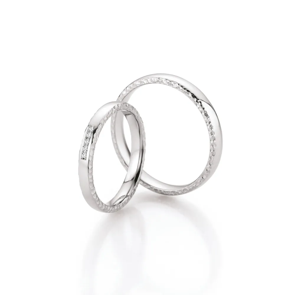 Alianzas de boda de oro blanco con diamantes