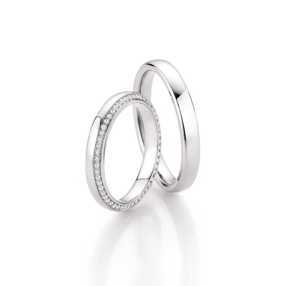 Alianzas de boda de platino con diamantes